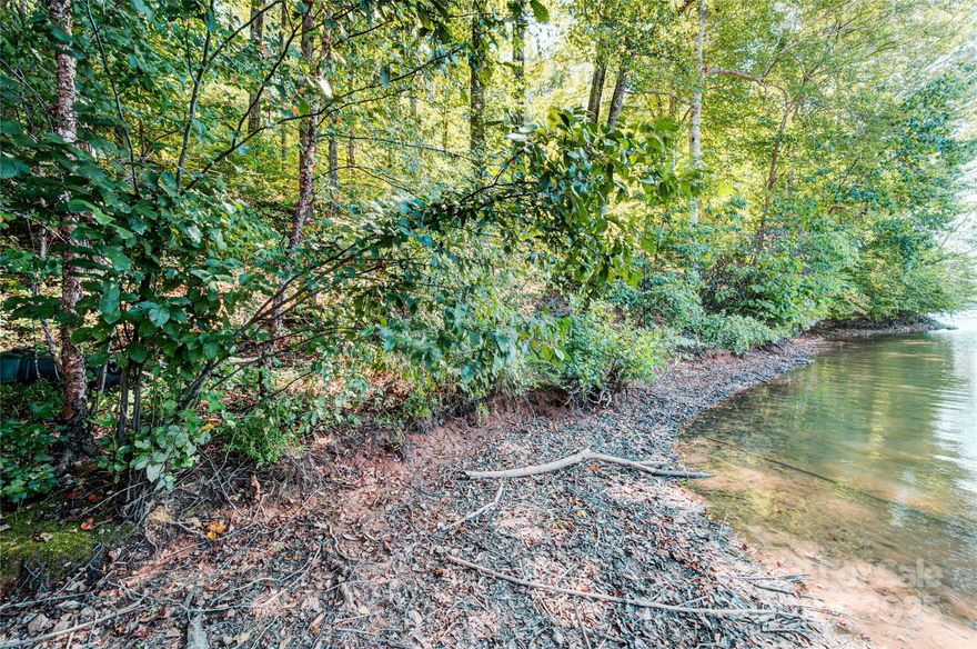 Incredible opportunity for a developer!  Waterfront acreage that has previously been approved for a dock by Duke Energy.  Excellent road frontage with access from Carriage Road as well as from High Shoals Lane and Troutman Shoals Road.  4 parcels to be sold together (4711-28-3897, 4701-96-3752, 4711-09-8335, 4711-072583).