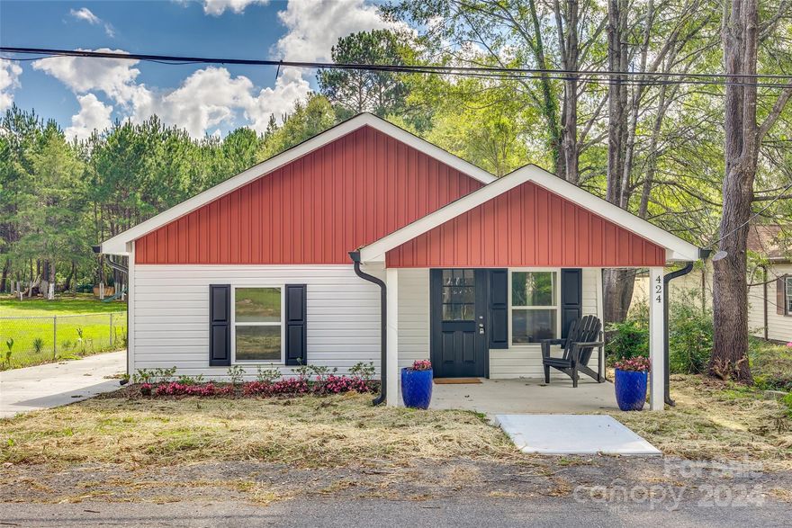 This charming 4-bedroom, 2-bath ranch home offers cozy and flexible living within walking distance of historic downtown York, SC. As you walk in you are greeted with a spacious family room. You will also find a versatile flex room, which can be used as an office, craft room, and/or sitting room. Outside, enjoy the covered front porch and the spacious back deck, perfect for relaxing or entertaining. The property includes a detached building with electricity, a concrete driveway for easy parking, and peace of mind with a transferable termite bond from Cramer Pest Control. With no HOA or restrictions, this home is ideal for both first-time buyers and those looking to downsize.