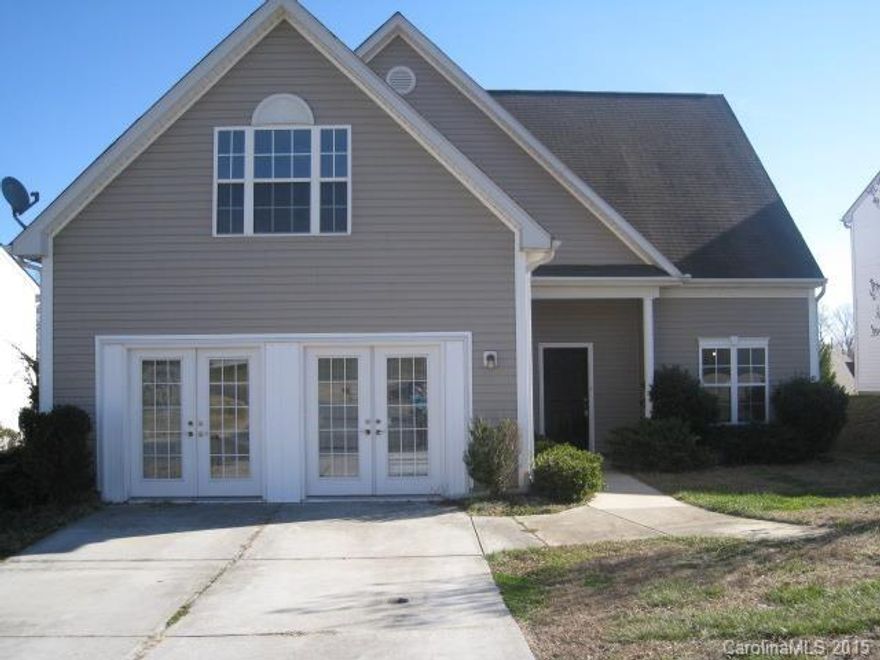 Lease Purchase is also available. This 4 bedroom, 2 1/2 baths has been remodeled, hardwood floors throughout main level and new painting that shows off the formal dining room. 1 bedroom downstairs and all other  bedrooms are upstairs with the laundry. Master Suite has separate Shower and Tub with double sinks. The community is family oriented with a great playground. This location is a requested location because of the Clover Schools. Clover Meadows Subdivision.