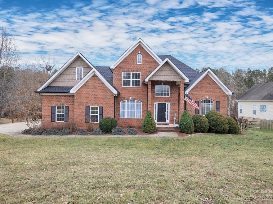 Beautiful Brickfront home in Sherrills Ford School District. No HOA! No city taxes! Meticulously maintained home and move-in ready! Enter the home into the two story foyer. Featuring formal dining room with large picture window. Soaring ceilings in Great Room, beautiful brick fireplace with gas logs. Oversized windows throughout the home bring in lots of light. Granite in kitchen, self-cleaning oven, disposal, maple finish cabinets, tile backsplash, breakfast bar as well as eat-in kitchen. Hardwoods in two-story foyer and formal dining room. New vinyl plank in Great Room for easy care. Tile in all baths. Primary bedroom on main level.  Primary bedroom features deep tray ceiling. Primary bath has garden soaking tub, separate commode, separate standing shower and dual sinks! Two more bedrooms on second floor with full bath. Bonus room has high ceilings and a wet bar. Lots of storage. New roof and gutters in 2021. 12x12 shed included with the home.  Fully fenced backyard, black aluminum.
