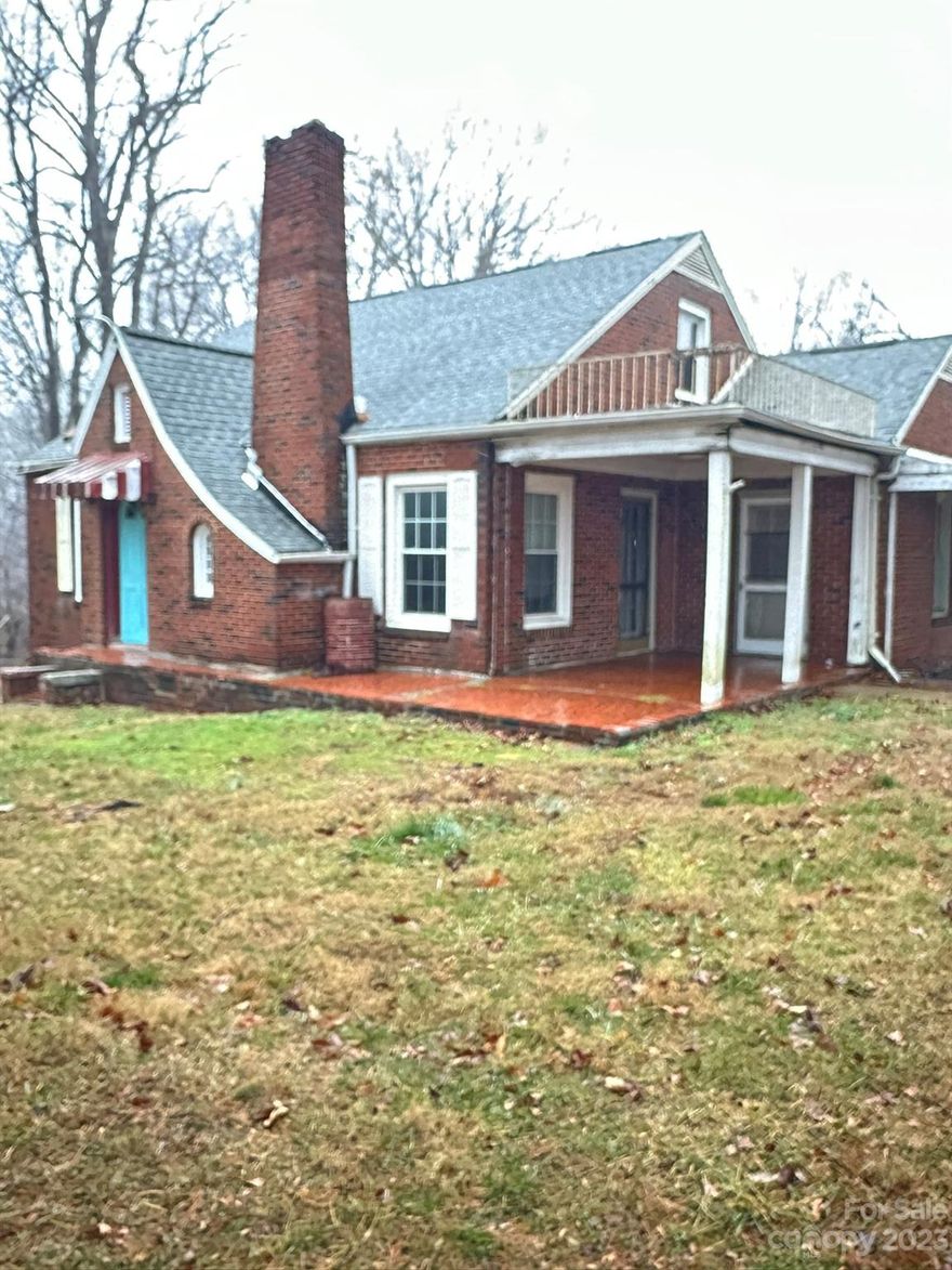 Attention Investors! Come see this charming 3BR, 1 BA brick Tudor style home built in 1942. This fixer-upper presents a unique opportunity for those with a vision and a passion for restoration. Original architectural details and hardwood floors offer a glimpse into the past. Main level Primary bedroom has walk in cedar closet. Knotty pine in the upstairs rooms brings back yesterdays charm. Convenient location and a solid foundation make this home an ideal project for the savvy buyer. Don't miss the chance to restore this gem to its former glory. Home sits on .50 acre corner lot. Property is sold 'as-is.' Your dream home awaits your touch