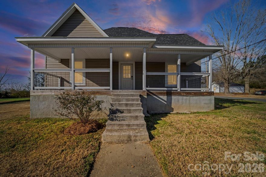 Step inside this beautifully remodeled 3-bedroom, 2-bath home that blends modern updates with cozy charm. Enjoy an open layout filled with natural light, new finishes, and a fresh, inviting feel. The kitchen features new cabinets and countertops, and both bathrooms have been completely updated. Relax on the large covered front porch or entertain on the oversized back deck. Sitting on a corner lot just minutes from downtown, this home is move-in ready and full of character!