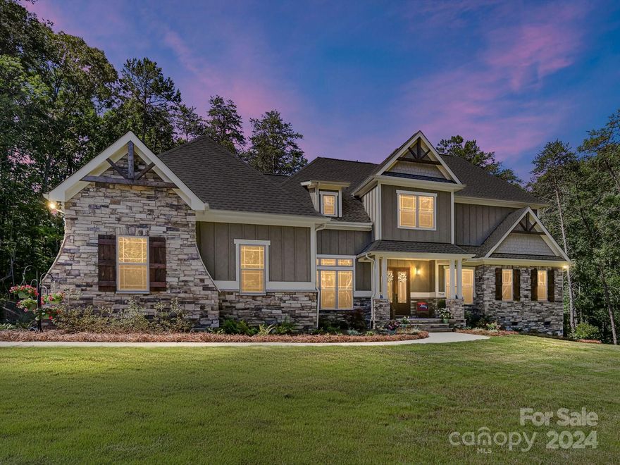 Incredible opportunity in gated James Plantation!  With over 3.3 acres and dense mature landscape, this cul-de-sac lot is almost off the radar.  Inside, the neutral palette of designer colors offer a continuity with nature.  From the alluring hardwoods, to the stacked stone fireplace, the transition from elements to elegance is seamless.  Primary Bedroom & Ensuite are also on point with indulging your senses.  Sink into the deep soaker tub, or melt in the spa-like shower with multi-valve controls.  Heated flooring & fashionable fixtures heighten the level of luxury.  The Chef's kitchen showcases sprawling quartz counters, gas cooktop and the oversized JennAir refrigerator.  With abundant storage options in the oversized closets, walk-in attic, and a 3-car garage, function is not lost.  The custom shutters & whole home water purification system also add to this home's value and uniqueness.  For those passionate about living an exceptional lifestyle, this home is worth a look!