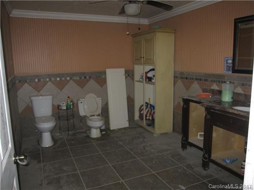 22,000 sf open space W/Sprinkler system! Convenient location, ideal industrial, warehouse, lt mfg, storage. High voltage (3 phase) to warehouse.Separate elec meter and access bays could allow for division and lease out to smaller space users.