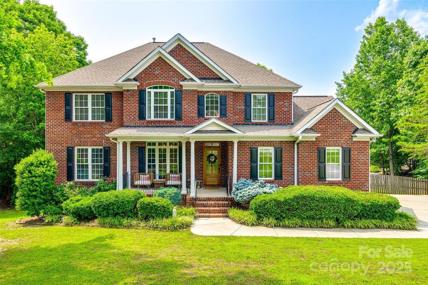 Welcome to the crown jewel of the neighborhood—this stunning 6-bedroom home is the largest, most upgraded property in the area. Designer inspired w. high-end finishes throughout exudes a custom & curated elegance, while offering exceptional space and style for the discerning buyer. The rare floorplan features a formal space that can be used for a den, dining room, or office, expansive living areas, & a fully finished walk out basement full of even more flex space—PLUS a private bedroom suite, perfect for multigenerational living, AND additional flex spaces for any buyers additional space needs. Situated on a premium private cul-de-sac lot with a beautiful salt water pool, large grassy fully fenced yard, seasonal water views, & an expansive deck, the outdoor space is just as impressive! This home is truly one-of-a-kind, ideal for those who crave room to grow without sacrificing luxury. Zoned for Rock Hill’s top-rated schools, it’s the ultimate blend of comfort, function, and location.