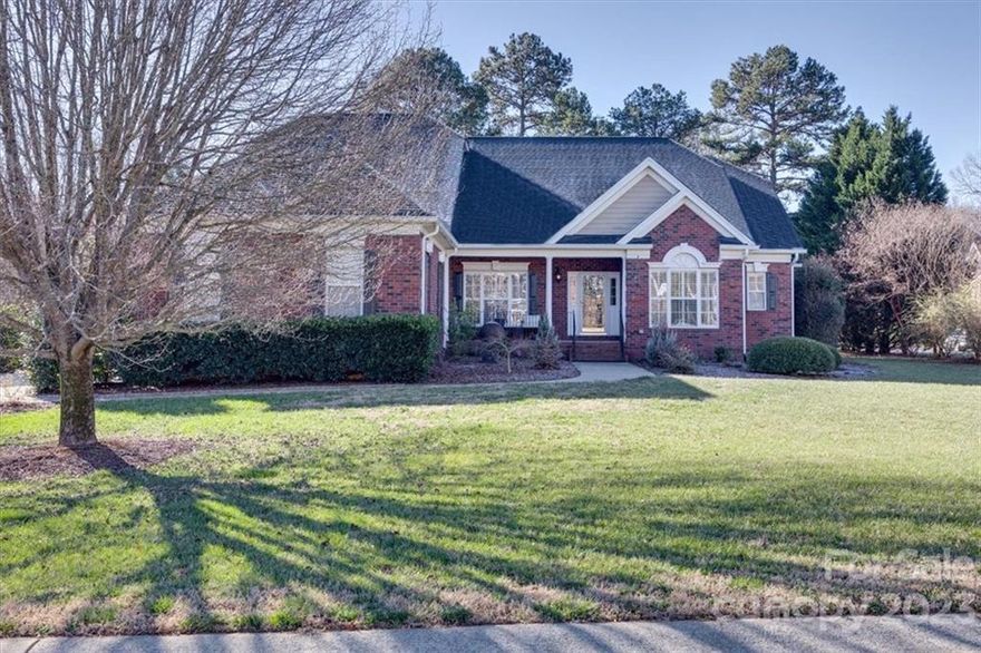 Absolutely Stunning Brick Ranch w/ 4th Bedroom/Bonus Room Over Garage! With An Almost Half Acre Corner Lot You Will Fall In Love With This Golf Course Community w/ Close Access to I-485 and Charlotte. Upon Walking Past The Rocking Chair Front Porch You Will Enter A Beautiful Foyer Immediately Noticing The Clean, Bright Wall Colorings, And Pickled Hardwood Floors. A Formal Office or Sitting Room Will Be To Your Right And Spacious Dining Room to Your Left. Entering Further Into The Home Is the Second Den w/ A Doubled Sided Gas Fireplace Into The Primary Bedroom. The Kitchen Boasts White Cabinets, Stainless Steel Appliances To Include A Double Oven, Gas Range, and Granite Counter Tops. A Spacious Breakfast Area Sits Off Of The Kitchen As Well As The Primary Living Room Again with a Gas Fireplace. The Primary Bedroom Has Tray Ceilings, A Bay Window, His/Her Closets, Soaking Tub, and Double Vanity. The Rear Yard Of The Home Is Fenced. You Will Fall In Love With The Custom Feel Of This Home!