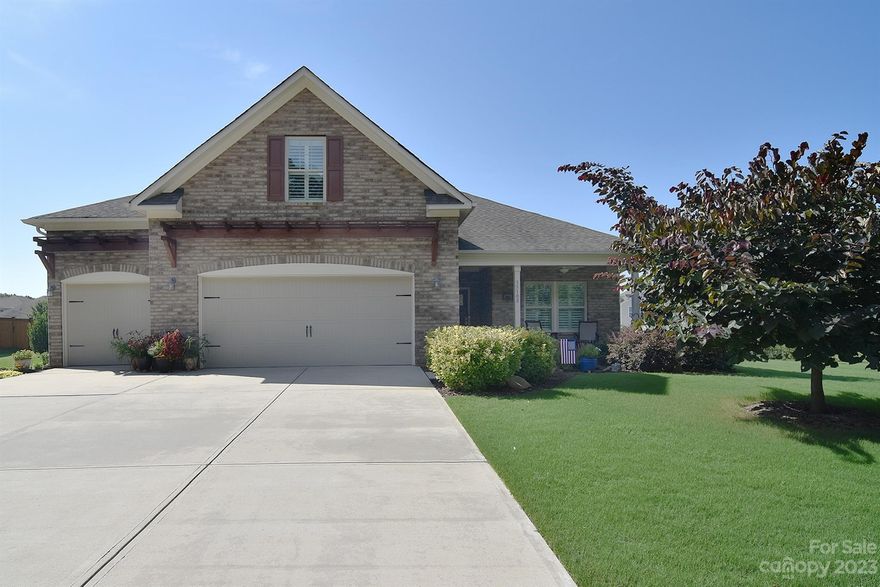 Meticulously maintained open concept ranch w/upstairs bonus room & many upgrades! Spacious KIT w/ granite counters, S/S appl’s, marble backsplash & plenty of storage. A breakfast bar opens to the dining & GRM allowing easy flow for daily life & entertaining. The dining area highlights a wood accent feature wall. The primary BRM is spacious & serene. Slide open the barn door to an en’suite offering LG vanity, step in shower & LG WIC. The front BRM is currently used as an office. Extend daily life & entertainment to the large 12'X20' screened room w/ stamped concrete floor, tongue & groove ceiling, recessed lighting & fan. An outdoor patio & extensive landscaping creates a peaceful backyard oasis. The 3 car garage is versatile w/ the 3rd bay currently a workshop/storage. Plantation shutters cover all windows. Additional upgrades include: crown molding, LVP flooring, new primary shower, new front door, folding counter & extra shelves in laundry rm & garage. Fresh paint in fall 2022!