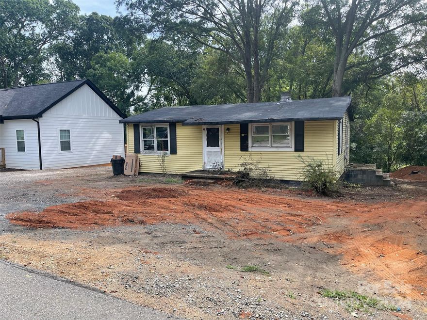 FIXER UPPER. Discover the potential of this prime fixer-upper, ready for transformation! Ideal for investors or buyers looking to create a home from the ground up, this property requires full updates to systems, including electrical, plumbing, and HVAC, offering a blank slate for customization. With no appliances installed, the kitchen is yours to design with your preferred style and finishes. Situated in a promising area, this property offers the chance to build significant equity. Bring your vision and make this home a true masterpiece—perfect for those with an eye for opportunity!