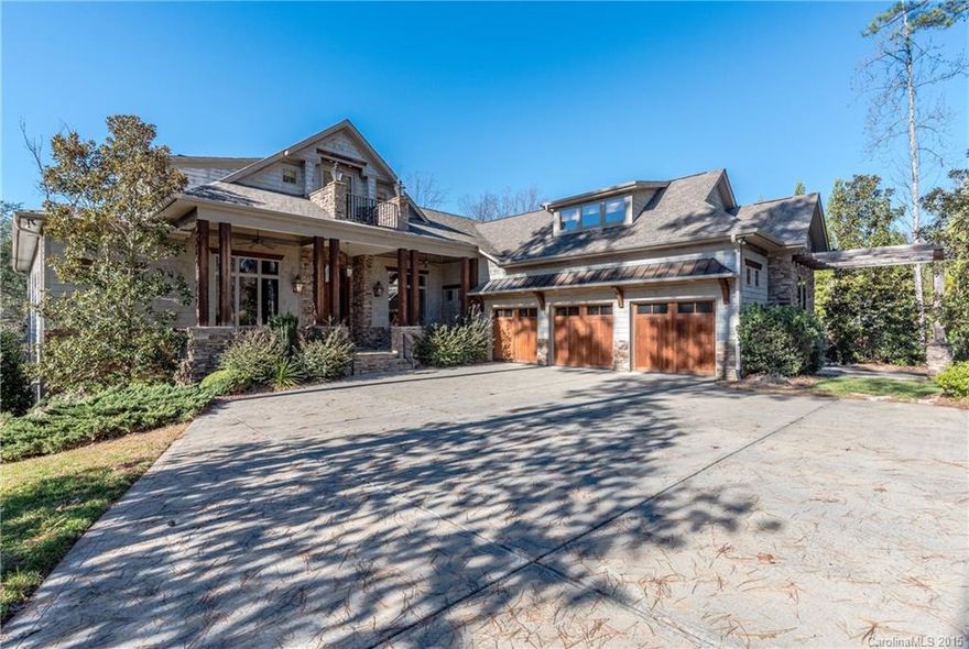 Beautifully maintained cul-de-sac lot w/ fenced yard, boat slip, & awesome water views! On-site finished hard wood floors. Salt water pool w/ hot tub, outdoor kitchen, & shower. Custom lighting, mouldings, and built-ins throughout! Great room features deep coffer ceiling, stone fireplace. Gourmet kitchen w/ stainless steel appliances (dbl ovens, prep sink, custom pendant lighting, gas cooktop).  Master suite on main floor w/ terrace access.  Second living quarters w/ full kitchen in basement.