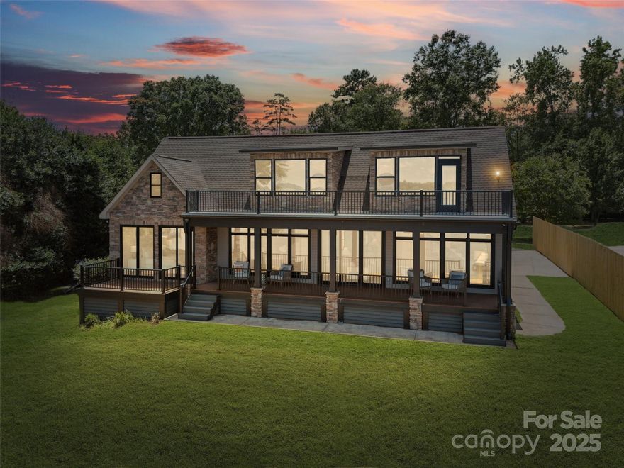 Luxury Living on the shores of Lake Wylie with Unmatched Views! Nestled in a quiet, upscale enclave with no HOA. This property offers the best of Lake Wylie, invite your guest to enjoy the unforgettable days on the water - whether its paddle boarding at sunrise, boating in the afternoon from your own PRIVATE DOCK or watching the spectacular 4th of July fireworks light up the night sky from your own private deck. The open-concept flr plan flows effortlessly, featuring a gourmet kitchen, spacious living room with a fireplace. Four spacious bedrooms includes its own en-suite bath, offering privacy and luxury for family and guests. The primary suite boasts a large tile shower, private balcony with impeccable views of the water. Huge bonus rm on 2nd level with bar for entertaining. Located within a top-rated, award-winning school district, just minutes from shopping, (with a new Harris Teeter being built just min away) dining, and recreation, yet tucked away in a private setting that feels like a true escape. (New Survey attached in doc) Every detail in this home is brand new. Totally gutted from the ground up to reflect 2025 style and quality. Owner is a builder and can make any structural changes or additions upon request! Pool can be added upon request as well! Views like this are rare!