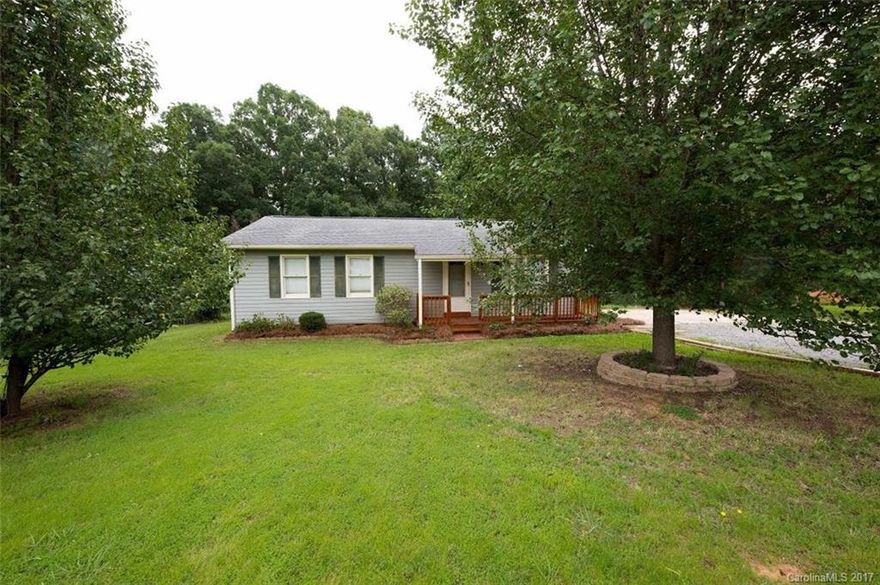 Complete Doll House - Ranch Home Featuring 3 Beds/2Baths &New Laminate Flooring & Carpet.  Perfect home for the 1st Time Home Buyer or Someone Looking to Downsize.  Eat In Kitchen w/Ceramic Tile Flooring & Breakfast Bar.  Large Tiered Deck off Back of Home, Fenced Yard & Storage Building.  Low County Taxes, Community Water and Septic Tank. No HOA & Covenants and Restrictions.  This one Won't Last Long!!!