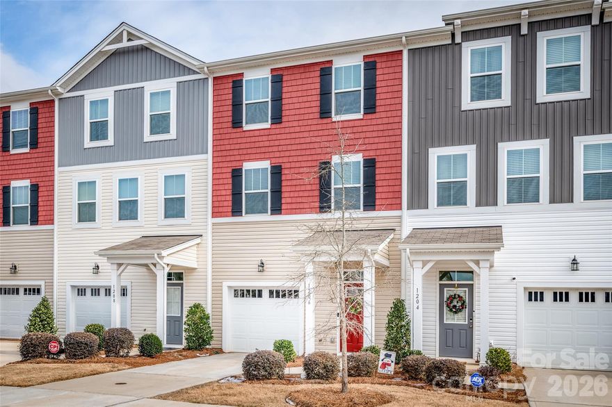 Welcome home to this beautifully designed, like-new, 3-story townhome offering upscale finishes, flexible living spaces, and low-maintenance convenience - perfect for today's lifestyle. The main level welcomes you with a spacious foyer and a versatile flex room that can easily serve as a bedroom, home office, or additional living space complete w/half bath and access to the backyard patio - perfect for relaxing or entertaining. The second floor showcases a bright, open layout ideal for everyday living and hosting. Enjoy the generous great room with private balcony, an expansive dining area and a gourmet kitchen featuring granite countertops, an oversized center island, stainless steel appliances, a pantry and abundant cabinetry for storage and functionality. Retreat to the third floor where you’ll find the well-appointed owner’s suite complete with a walk-in closet and a private ensuite bath featuring a double vanity and walk-in-shower. Two additional bedrooms, a full hall bathroom and a conveniently located laundry area complete this level. Residents of the community enjoy a carefree lifestyle with included lawn care and access to exceptional nearby amenities including the world-class U.S. National Whitewater Center offering endless outdoor recreation. Shopping, dining, parks and entertainment are just minutes away, with easy access to major commuter routes.