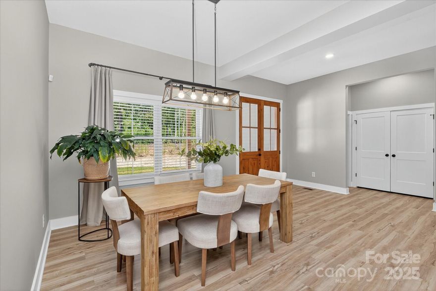 NEW PRICE POINT!!!!!

Where Modern Farmhouse Living Meets Untamed Carolina Beauty! Welcome to 997 Skyland Drive S a hidden haven tucked away on 9 acres of lush, wooded tranquility just moments from the charm of downtown Mount Pleasant. This thoughtfully designed modern farmhouse offers the best of both worlds: total seclusion and serenity, paired with quick access to dining, shops, and small-town life.

Surrounded by towering Carolina pines and complete with its own workshop, this is more than a home it's a lifestyle canvas. Whether you're dreaming of a hobby farm, a private retreat, or even equestrian life with space to graze and ride, this property delivers room to envision, create, and grow. This gem of a property offers endless potential in a truly serene setting.

Inside, the home boasts 10’ ceilings and a well-appointed 4-bedroom, 3-bath layout that is as functional as it is inviting. Highlights include an oversized 2-car garage, a walk-in pantry, and a dreamy screened-in porch perfect for sipping morning coffee or unwinding at sunset. A 24x40 steel-frame building with power and a 12-foot garage door sits on a concrete slab, ready to accommodate projects, storage, or your next big adventure.

As of June 2025, an additional perc test confirmed the potential to support a standard underground septic system for a three-bedroom home adding flexibility for future development or expansion.

Bring your vision, your people, your horses — or even your tractor — and discover what it means to truly live unbothered, unplugged, and unbelievably free.