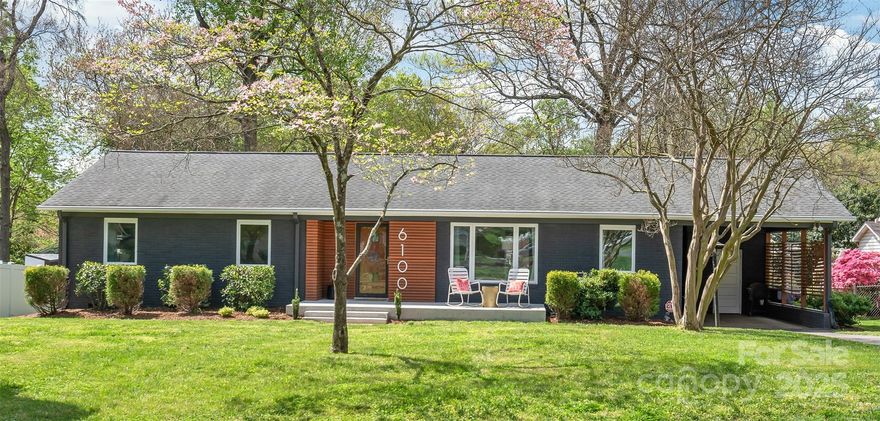 Welcome to 6100 Rose Valley Drive! This beautiful home sits in the heart of Southpark’s desirable Montclaire neighborhood and is minutes away from parks, restaurants, shopping and the Greenway!   
The first thing you notice is it's stunning curb appeal with it's custom woodwork accents that captures it's  classic MCM ranch vibe.  Step inside and take note of it's original hardwood floors, lovely natural light, the large inviting living room, and it's natural charm throughout the home. The kitchen, fully renovated in 2023, is a piece of art and a cook's dream. Notice the 2 closets in the primary bedroom and the home's great storage. Step out to the radiant sunroom and capture a peek of Spring in bloom outside it's plentiful windows.  Enjoy the deck and fantastic fenced in backyard which is perfect for a hosting friends or enjoying a relaxing evening outside.  Take note of the rare Montclaire carport with extra storage!   This unique home needs to be on your home tour list today!