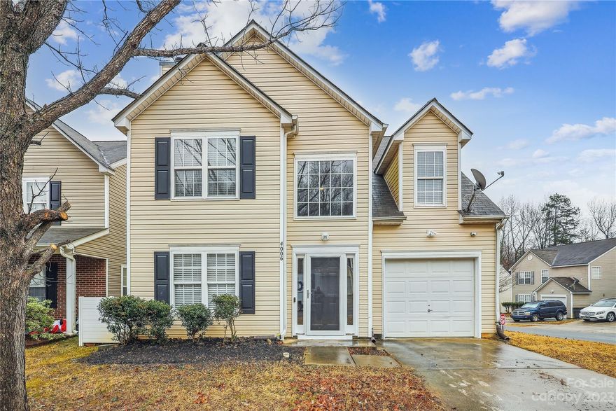 Charming 2-story corner lot home, conveniently situated within minutes of uptown Charlotte, Camp North End, Northlake Mall area, I-85, and I-77. This property seamlessly blends its original characteristics with updated features. Enjoy spacious living areas, updated elements, and proximity to key urban hubs. Experience the perfect blend of comfort and elegance as the great room and dining room gracefully flow together, offering a spacious entertaining area accented with a fireplace and columns. The kitchen is equipped with stainless steel and black appliances. The primary bedroom offers vaulted and tray ceilings with dual closets. Primary bathroom offers a garden soaking tub separate from the shower. Recently installed LVP flooring adds a fresh and stylish touch to the entryway, kitchen, laundry room, and upstairs bathrooms. The home was completely refreshed with interior paint of the walls and cabinets. It’s the perfect starter home!!