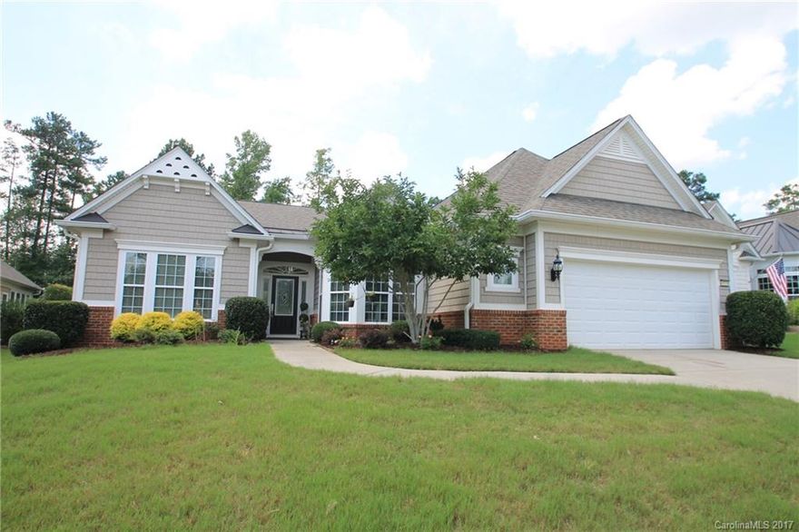 Immaculate Cumberland Hall along the 16th Fairway w/ privacy berm. Open floorplan features eat-in kitchen w/ tray ceiling, stainless gas appliances-including cooktop stove, formal dining room w/ wainscotting, & light-filled great room w/ corner fireplace. Luxurious master suite features tray ceiling, wall of windows, huge walk-in closet, & master bath w/ garden tub & shower. Updates to the home: new A/C 2015, new hardwoods, & spacious 3-season room w/ tile floors. Age 55+ community