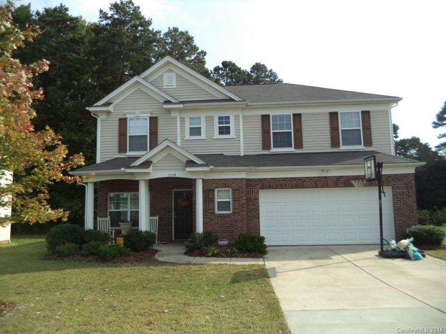 Located in desirable Mint Hill, this lovely 4 bedroom home has an open kitchen concept with cherry cabinets and granite countertops.  With a covered patio, this home sits on a beautiful lot with private backyard looking into a natural tree area. Private trails are a special part of Versage.  A community pool makes for much summer fun. A short walk to Independence High School.