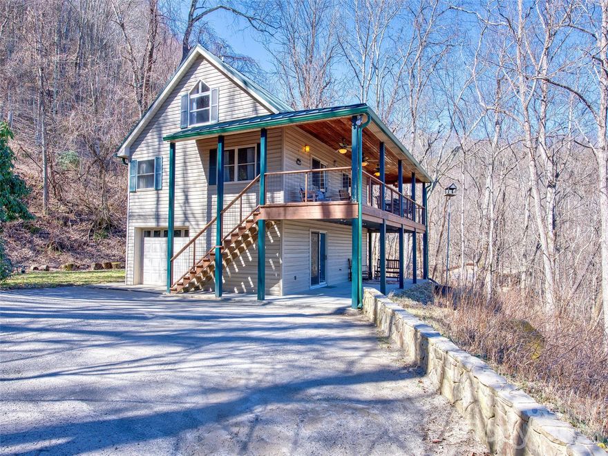 PERFECT LOCATION. PERFECT VIEWS!!  Private custom built mountain home with a split bedroom plan on 3 Levels. Year Round Long Range, Layered Blue Ridge Mountain Views. Plenty of room to spread out with 2 full bedrooms plus a bonus 358 sq ft sleeping loft (not counted in total sq ft) along with a flexible use lower level den/guest room. Two full baths. Step outside to an additional 1000 sq ft in porches and decks. Enjoy the majestic Blue Ridge Mountain views while entertaining or relaxing. Pine hardwood floors, ceilings, walkway and loft add to the charm and lodge like feel. Enjoy peace of mind including a new HVAC system and dishwasher in 2025, 50 year metal roof, gutters and refinished deck and rails in 2019. Extensive updates and upgrades throughout. All the hard work is done. Home comes FULLY FURNISHED and ready to move in. All paved road access to home. Just a few short minutes to Waynesville and Maggie Valley Restaurants, Shopping, Schools and Medical Facilities. Short Term Rentals allowed. Great family vacation home, private home or short term rental.