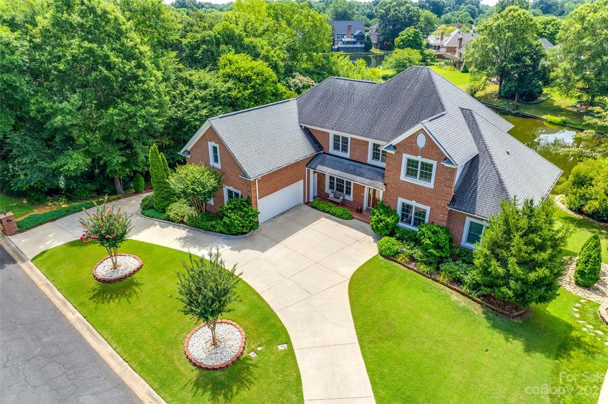 Nestled within the charming, well-established Bailiwyck community, Fort Mill, SC, awaits a remarkable opportunity-a multi-generational home where 2 families can seamlessly coexist. This property boasts 2 separate, complete living areas, each with a 2-car garage w/separate access, & two kitchens, where cooking becomes an art shared between generations. No need to worry about laundry piling up, as this home showcases not one, but 2 laundry rooms. From each level, the breathtaking water view of the serene pond is mesmerizing; imagine waking up every morning to the tranquil sight. With ample living & storage space to accommodate both families comfortably, each member will find solace within their own private sanctuary while still fostering a strong sense of togetherness throughout this splendid residence. Community features include a pool, clubhouse & tennis courts. The era of multi-generational living has arrived at its pinnacle within these walls – it's time for you to make it your own!