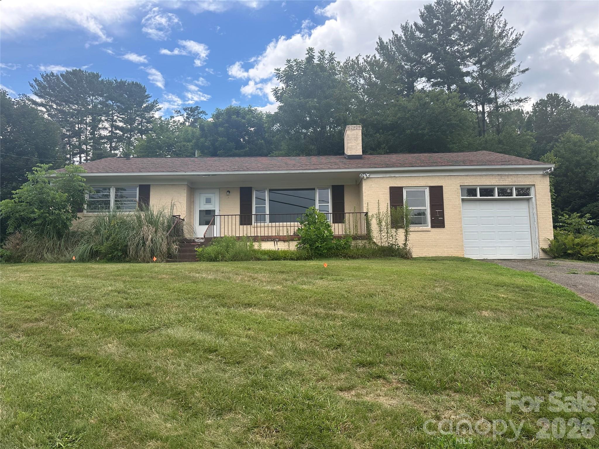 Photo 1 of 18 — 610 Enka Lake Road, Candler, NC 28715