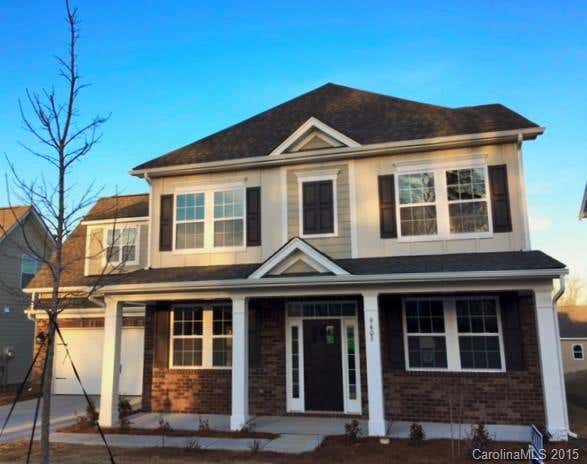 This beautiful open floorplan is loaded with options! Hardwood floors, granite counter tops in kitchen and in full baths, stainless steel appliances, gas range, enormous owner's suite and bath with large shower w/seat, separate garden tub!