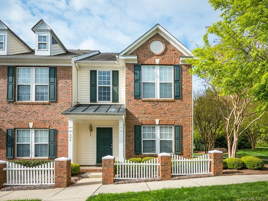 This gorgeous end unit townhome is a MUST SEE! Great location close to shops, dining, & I-77! This beautiful home is loaded w/ upgrades including new carpet, new AC, Dishwasher, new water heater, & more! Gleaming laminate wood floors spread throughout majority of main! Spacious open floor plan allows for easy indoor entertaining! Large master features tray ceiling, walk in closet, & a serene en-suite! Fabulous community pool in quiet neighborhood. Schedule to see it today as it won't last long!