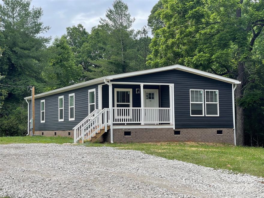 Property may qualify for 100% USDA Financing. Seeking the Serenity that your own private acreage brings? Find it here! Come and see the beautiful 2 acres, sit on the deck and hear the sounds of nature all around. Privacy with a convenient location.  This spacious, new 3 bedroom, 2 bath home has a large deck accessed from the kitchen. Open concept living, dining/flex, kitchen. Huge primary bath, generous closet space throughout, and laundry room large enough for an extra freezer. Both cleared and wooded areas to enjoy the natural beauty of your homestead. Peace and Tranquility are waiting for you here, come see it today.