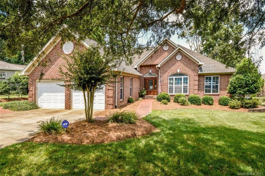 Beautiful all brick waterfront ranch home w/finished basement. Amazing views of Lake Norman from all of the windows & screened in porch. Unbelievable custom wood trim, cabinets, built ins & ceiling designs thru out! Home has been updated thru out to include kitchen custom cabinets, granite, stainless appl & hardwoods on main level. Basement level is to die for w/ huge rec room, bedrm, full bath & custom built bar & kitchen w/fridge, dishwasher &  microwave. Authentic keystone retaining walls.
