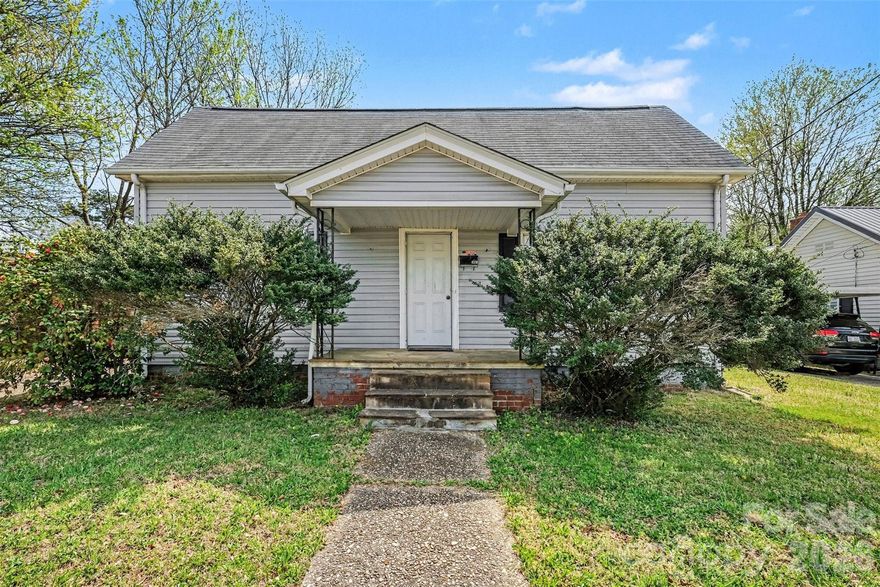 Charming and full of character, this inviting Salisbury home offers a warm and welcoming feel from the moment you arrive. Set on a tree-lined lot, the home features classic curb appeal with a covered front porch that creates the perfect spot to relax and enjoy the surrounding neighborhood.

Inside, you’ll find spacious living areas filled with natural light and a comfortable, easy-flow layout. The main living room offers a cozy atmosphere with plenty of room to gather, while the adjoining dining area connects seamlessly to the kitchen, creating a functional space for everyday living. The kitchen showcases extra wood cabinetry and generous workspace, blending charm with practicality.

The bedrooms are well-sized and offer a peaceful retreat, while additional flexible spaces provide options for a home office, guest area, or hobby room. Throughout the home, a blend of textures and finishes adds to its character and livability.

Step outside to a backyard that offers both privacy and potential. The covered patio extends your living space outdoors, making it ideal for relaxing or entertaining, while the surrounding yard provides plenty of room to enjoy gardening, pets, or outdoor activities. A carport adds convenience and functionality, completing the property.

Conveniently located near local shops, dining, and everyday amenities, this home offers a great opportunity to enjoy comfort, charm, and accessibility in a well-established Salisbury setting.