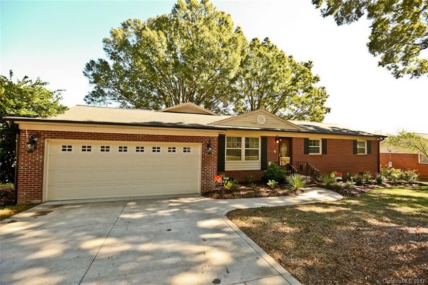 Do NOT delay seeing this gorgeously remodeled ranch home in Northwest Cabarrus.  This 3BR/2BA home will not disappoint! Open floor concept with gigantic family room centered around rock wood burning fireplace.  Remodeled kitchen, bathrooms, laundry room and much more.  Nestle on an almost half acre lot, the back yard with huge oaks trees is perfection!  Custom built workshop/outbuilding is a dream come true, with upstairs space ready to be finished into heated living area.