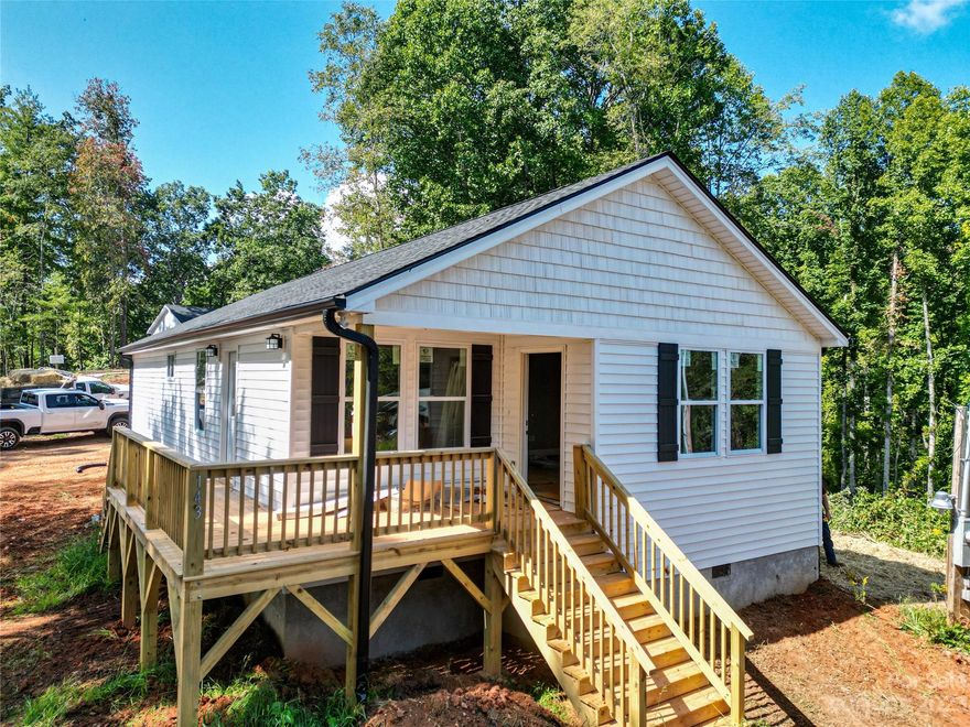 Brand new construction centrally located and convenient to everything Canton has to offer. Open floor plan bathed with warm natural light is perfect for entertaining. Roomy primary bedroom boasts an extra large walk-in closet and elegant primary bath with dual vanity and refreshing custom tile shower. Luxury vinyl plank flooring, fabulous kitchen with stainless steel appliances, granite counters, spacious all-plywood soft close cabinets, under cabinet lighting, and the perfect kitchen island. Neutral colors make decorating a breeze. Large decks are a spectacular place to enjoy that clean mountain air. Well-priced, move-in ready and waiting to hold all of your fond memories or become your next charming retreat or sought after investment property. Finished interior pictures are shown as an example. Finishes are consistent, but may vary slightly depending on availability. Tax value based on previous vacant land and does not represent current improvements.