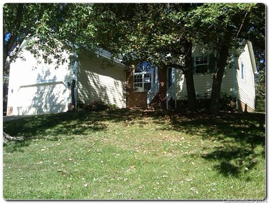 Charming and Spacious split bedroom floor plan with a large great room, masonry fireplace, open kitchen,  separate shower and garden tub in the master bedroom, vaulted ceilings, fenced back yard with deck and Shed.