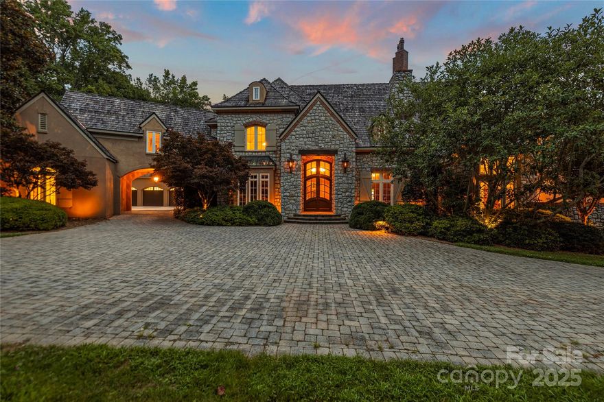 Timeless, Irreplicable estate on 5.5± ac blends stylish sophistication w/ unparalleled craftsmanship! Backyard paradise boasts saltwater pool, hot tub, outdoor FP, covered patio & POOL HOUSE w/ full bath. Don't miss the equipment/lawn storage beneath. Architecturally positioned for privacy & a WOW factor. Every design detail reflects luxury, w/ rich textured walls & ceilings throughout. Something special awaits behind every door. A chef’s dream kitchen features bespoke cabinetry & luxury appliances. TWO elegant home offices offer flexible WFH options. Soaring 2-story great room w/ vaulted, beamed ceiling & stone FP adds cozy ambiance. Temp-controlled wine room is a showstopper. The private primary wing offers a spacious suite, spa-inspired bath w/ hidden vanity, WIC w/ custom built-ins & flex BR. Entertain on the upper level which is home to a  bar, rec room, media room & huge separate bonus w/ built-in bunk beds. Gated community with pool & sport court. Read captions for full details!