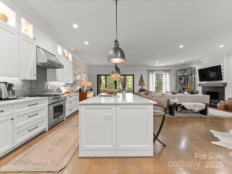 Gorgeous duet built by Sixteen Penny, located on Kings Drive in Myers Park, with an expansive back yard common area leading to the Greenway. Minutes to uptown and midtown, walking distance to Dilworth and Freedom Park, this 2-story home offers an open floor plan, hardwood floors, gorgeous custom cabinetry, 3 bedrooms, 4 full baths and an upper-level additional den with built ins. The foyer has custom ship lap opening to the main level den, family room, kitchen and dining. There is a covered porch and steps leading to a small enclosed backyard, perfect for an additional sitting area or yard area for pets. The kitchen has high end Thermador appliances and a large center island with marble countertops. The upper level has a large primary bedroom with a balcony, beautiful primary bath and large custom closet. There are 2 generously sized bedrooms, each with its own bath, laundry room with sink, dedicated office desk area, and den. 2 car attached garage and a tankless water heater.