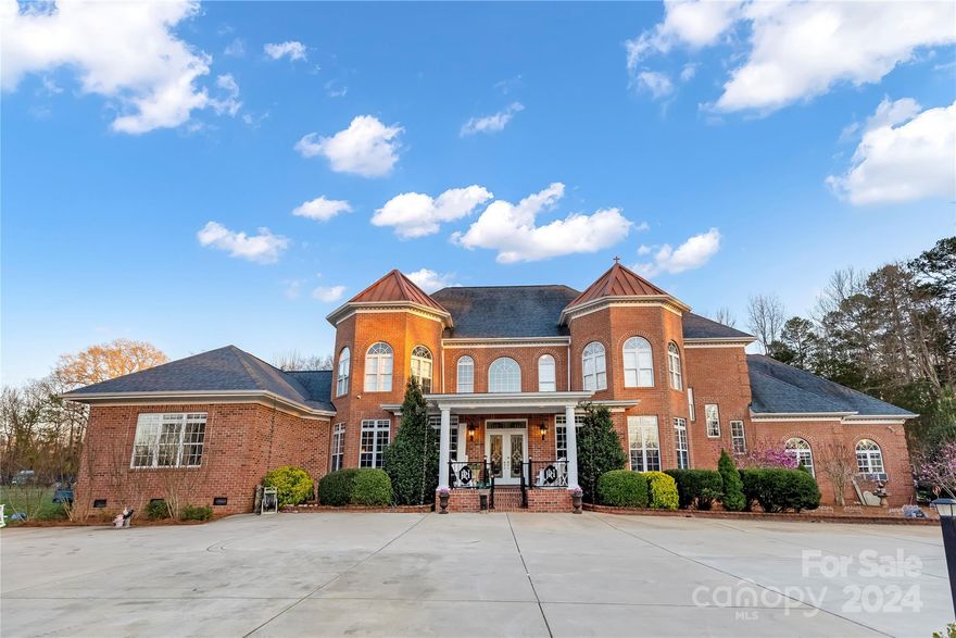 PRICE REDUCED TO $1,799,000!   Welcome to this elegant custom-built residence nestled on 2.43 acres of picturesque land in the desirable Marvin School district.
With 5 bedrooms, 5.5 bathrooms, and over 6,000 sf, this estate offers both luxury and functionality with amenities one would expect from a home of this caliber, including an electric gate leaving quite a first impression.
If the grand entrance doesn’t captivate you, then the passage from the foyer into the 2-story parlor with views into the elegant sitting and dining rooms surely will.  
The property's crowning jewel may be the vaulted conservatory that is complete with a wood burning brick fireplace and features such as French doors that open to a luxurious pool and spa area.
In addition to the formal living area, you will find a gourmet kitchen open to the great room and a gorgeous office with two walls of windows.  
For the RV and Boating enthusiasts, the home boasts a large outdoor building where toys can be stored.