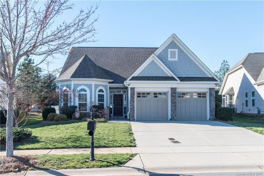 Gorgeous Heavily Upgraded Open Floorplan Home in great neighborhood convenient to shopping, I-85, schools, & Northeast Medical Center. Home features: large master bedroom on main level w/dramatic trayed ceilings,  granite, 42” upgraded cabinets & dovetail soft touch closing drawers, stainless appliances, 5" designer hardwoods, tiled baths, upgraded lighting, gas fireplace, screened-in porch, private level fenced yard w/irrigation, extensive walk-in storage. Lawn care included in HOA dues.