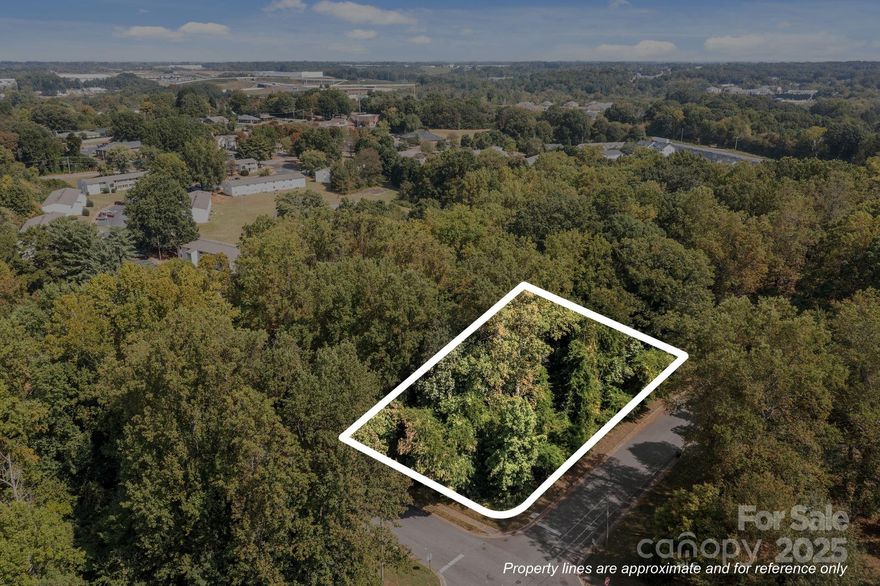 Fantastic opportunity to build your dream home on this .44-acre corner lot in a prime Statesville location! Nestled in Iredell County, this property offers added frontage and flexibility that a corner lot provides, with convenient access to local amenities, schools, and major highways. Bring your own builder. This is the perfect spot to create the home you’ve always wanted. Per Statesville City, taps for both water and sewer currently total $7,697 if the City installs the taps.