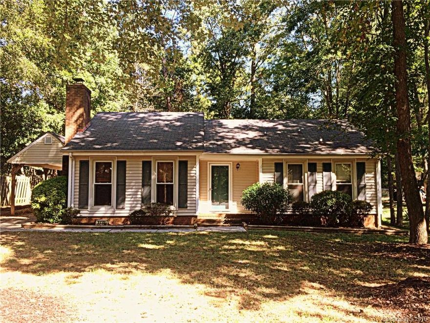 Cottage style home in great location close to shopping, restaurants & medical. 2 Bd., 1 bath home has much to offer. Eat-in kitchen w/pass thru to vaulted living room allows viewing access to TV area & cast iron wood burning  insert. Master bdrm has private sink area w/his & hers closets. Large wooded fenced backyard w/storage shed.  Carport was built 6 years ago & includes storage attic. Plenty of patio space for entertaining. Exterior locked storage room at back of house.  20 min. to uptown.