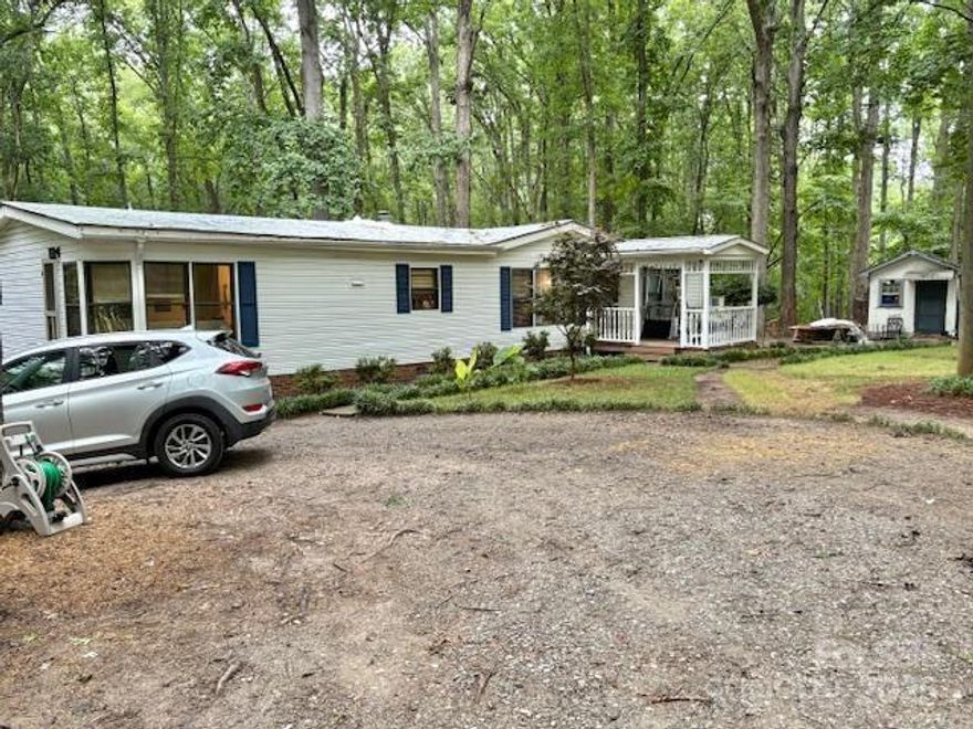 House & 4 Beautiful Acres +/- in a Great Clover Location all Paved Roads to the property ! Best Schools ! Family Rm w/Fireplace. Kitchen w/Center Island. Covered Front Porch. Private Storage Shed. Seller was in the process of Remolding, became injured therefore fell behind, now they cannot complete the remolding project. Sellers Plans to Leave the Building Materials they have gathered With the Sale of the Home, they have approximately 70% of Building Materials on-site including, Porcelain Floor Tiles, LVP Flooring, New Carpet, Wood Trim, Mirrors, Outside Deck Boards, New Tub & such. Washer, Dryer & Refrigerator to convey. 420' of Road Frontage. RV and Boat Storage, No HOA or Fees. Property restored and finished could possible be worth & sell for betw $340,000 - $350,000. Cash or strong conventional "as-is" offers considered. Potential to Split the Lot may exist, however the county can confirm, suggest you speak with county before submitting an offer if this is your buyers intention.