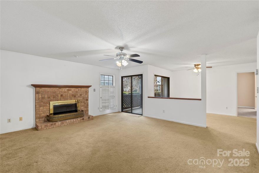 Spacious End unit First Floor condo that overlooks the club house and pool in East Charlotte's Harris Lake Condos.    This cozy unit features two bedrooms and two baths in a split plan.  The primary bedroom has a garden tub and dressing area with spacious walk in closet.   Small and casual foyer opens up to the living space quickly giving the condo a nice laid-back feel.  Relax in the comfortable size living rooom with fireplace or on the roomy covered balcony/porch that is within steps from the club house and pool.  Two sliding glass doors allow access to the large balcony/porch.     Refrigerator remains.  Washer Dryer area is in the kitchen.  Washer dryer does not remain.  Gas fireplace is as is : no known problems. The condo is being sold "As Is" condition.  Roof was recently replaced with architectural shingles.  Bring your own creativity and update ideas for the interior.   You have the perfect canvas.