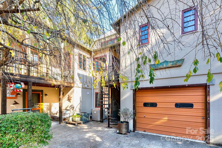 Is this the most interesting property available in Asheville? Even without the eclectic furnishings (some of which are available), the unique and versatile layout lends itself to a variety of uses: single-family, multifamily, rental, live/work, artist studio, retail/commercial, or a mix. Zoning is the rare and coveted Neighborhood Business. So many extraordinary touches and endless customizations make it special, showing the high quality and thoughtful design. The studio apartment is being left fully furnished/turnkey and has been a reliable rental at $1800+ per month. Second floor living area has been rented for $2600+ per month. The first floor live/work space is also being prepared for rental which will bring in additional revenue. Amazing location in a friendly neighborhood in between Charlotte St and Merrimon Ave and just a mile to downtown. 3 bedrooms, 4 bathrooms, 3 kitchens, plus a bonus loft at the top! City confirmed that homestay short term rental STR possibility with two of the units with minor modifications if you live in the third. Sellers explored connecting the first and second floors to make it a more traditional two-story home but preferred the current layout so that hasn't been done but is possible according to the sellers and the City. It is well built and well-maintained. Provide proof of funds or preapproval letter with showing request. Check out the 3-D walk-through to get a sense of the layout and efficient design.