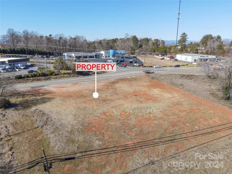 THE LAST COMMERCIAL CORNER TRACT. 0.8 miles to i-40. Zoned GB-CU. High traffic Visibility. Also includes (Record# 8876, PIN 1792841069) combined 2.5+/- acres. Wide variety of commercial, business and office uses. Underground natural gas & utilities available. Adequate City water and sewer present to serve any commercial use proposed. Close businesses include LOWES, Rural King, Big Lots, Food Lion, Morganton Honda Dealership and multiple National Fast Food Chains. (refer to MLS#3577251)