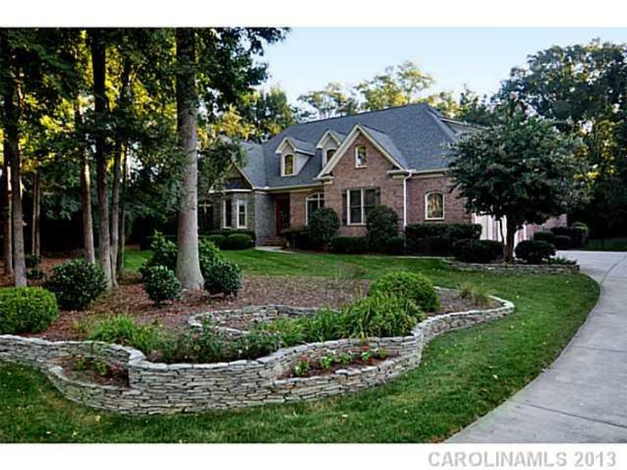 Immaculate! Well manicured private lot. Kitchen w/ every bell & whistle; 6 burner gas stove w/ 2 ovens, pot filler, 48" Cabinets, wine chiller, built-in refrig., granite ctrs. Gunite salt water pool & spa. Beautiful screened porch.Travertine floors thru out main.Oversized 3 car garage. Elegant Master w/huge walk-in closet w/heated floors!Main flr office w/ built-ins.