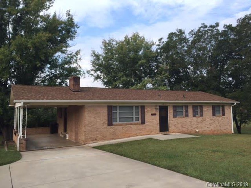 Must See!!! This recently updated brick ranch down Hwy 18 South. This 3 bedroom, 2 bath with a full unfinished basement sits on a total of 0.67 of an acre lot. Sellers are selling the vacant lot next door with the home. Home consists of large living room with gas fireplace, hardwood floors, open kitchen, tile in baths, his/her sink with newly updated bathrooms and a full basement for plenty of storage. New roof in 2014!!! Home also carries a 1 year home buyer warranty.