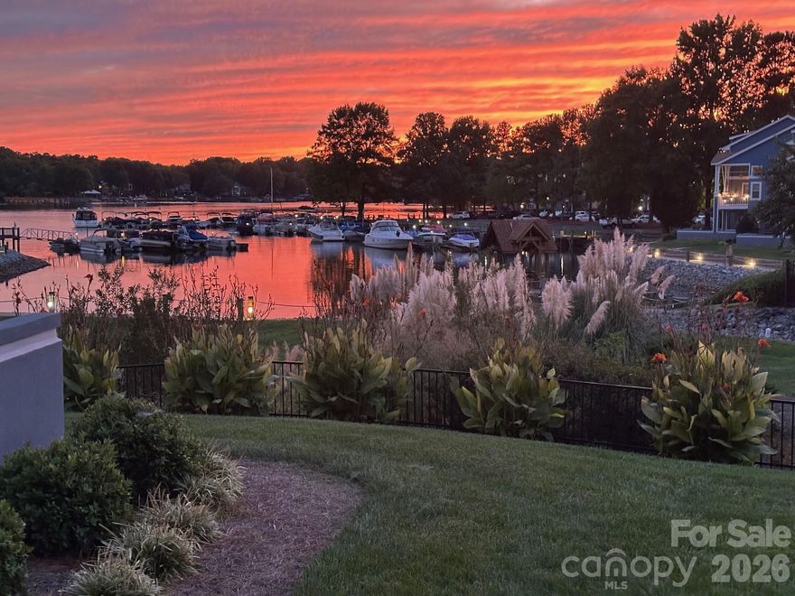 This ground floor waterfront condo on Lake Norman has nearly every upgrade you could imagine. Unbelievable attention to detail in the kitchen with custom cabinets, pull out spice racks, leaded glass upper cabinets, granite, farmhouse sink, soft close drawers, and more. GE Profile appliances include a refrigerator with double doors and a convection microwave, New Maytag Washing machine, and a dryer included. Oil rubbed bronze fixtures and hardware, tumbled stone backsplash and a walk-in pantry with pull outs are just a few of the other additions. Hardwood floors with honey stain in main living areas and slate tiled floors in the bathrooms for low maintenance upkeep. Both closets are custom through California Closets and have drawers, belt/tie racks, and custom dressers making use of every inch of the closets. Home has 9 foot smooth ceilings, crown molding, ceramic tiled showers, and Andersen windows in both bedrooms. A built-in banquet for dining with bead board and storage conveys. A gas log fireplace with marble surround in the great room and an oversized Trex deck and slate tile patio for viewing the amazing sunsets over Lake Norman are features you rarely find. A huge, sought after boat garage of over 400 sq ft maybe available for purchase directly from the sellers. School assignments are subject to change.