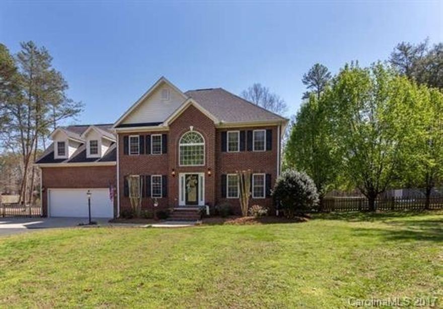 4 Oversized Bedrooms, 2.5 bath home on 2.44 acres, with tons of living space! Two Story Foyer, formal living and dining room, great room with corner fireplace/gas logs. Kitchen has new granite counter tops and stainless steel appliances. Ceramic tile flooring in kitchen, breakfast room, rear hall, laundry room and all baths. Covered patio overlooks above ground pool, deck, spacious wooded area. No HOA, County Taxes Only, RV Parking, great schools. Close to Lake Wylie camping/boat access.