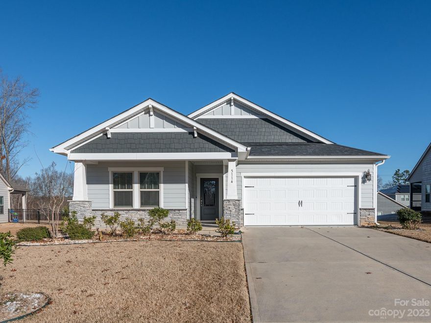 Beautifully open ranch style home with family friendly community amenities just steps from shops & restaurants in Wesley Chapel & Downtown Monroe. Welcome in through entryway to expansive living, kitchen & dining. Wood plank flooring throughout main living area and tons of windows flooding the home with natural light. Gourmet chef's dream kitchen with oversized center island for additional seating. S.S appliances including wall oven & gas range plus bright white cabinets & full pantry for storage. Primary bedroom w/ tray ceiling and en-suite including walk-in closet, stand-up shower & double vanity area. 2 additional bedrooms perfect for guests or a home office space plus full hall bath. Large screened-in porch overlooking private yard great for ALL seasons. Family Amenities include pool & playgrounds. A MUST SEE!