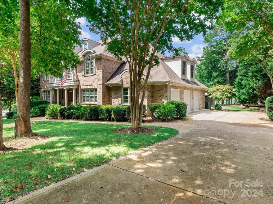 Experience luxury living in this meticulously REMODELED ESTATE w/BOAT SLIP, on a prime corner lot just shy of AN ACRE on the 8th green of Trump National Golf Course. This home offers a blend of elegance w/an outdoor spa & screened-in porch w/golf course views. The MAIN FLOOR features a remodeled PRIMARY SUITE & ensuite with heated floors & large walk-in shower. The heart of the home is a GOURMET CHEF’S KITCHEN, updated 2022, which includes high-end Wolf appliances, quartzite counters, a built-in Sub-Zero fridge & butler’s pantry. No detail has been overlooked, from the NEW ROOF & GUTTERS (2023) to the built-in central vac, alarm system, & new hot water heater. Features new oak hardwood floors, white shutters, all-new paint, custom woodwork, & a marble fireplace. REMODELED BATHROOMS. A 500 sq ft bonus room with woodwork & hardwood floors provides versatile space for a media room, gym, pool table, or playroom. Move to LKN & enjoy this impeccable home & lifestyle it offers.