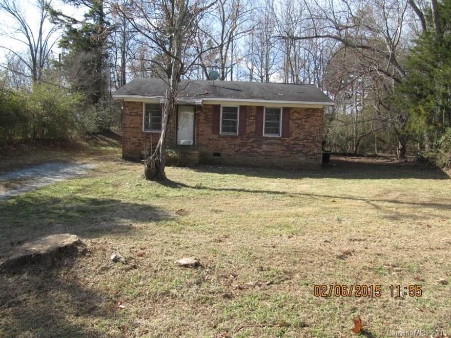 Three bedroom, one bath, brick veneer ranch style home near Moss Lake.  Hardwood floors.  Partially wooded back yard.