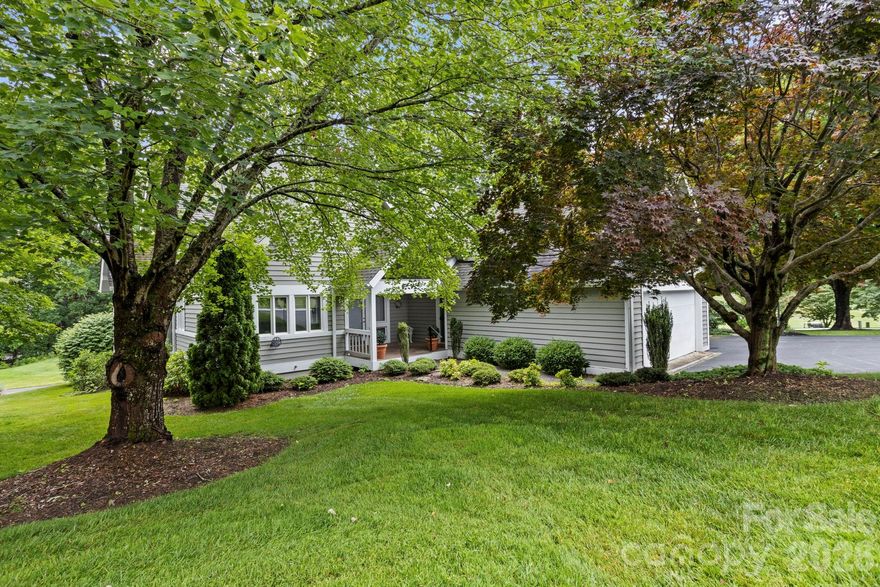 PRIME LOCATION! Stunning villa with level driveway/entry overlooking the 15th hole in Kenmure- a gated golf course community. Premier location and only a short stroll to the clubhouse and amenities. The main level boasts hardwood floors, cathedral ceilings, well designed open floor plan, great room with wall of windows to enjoy the view, gas fireplace flanked by built-ins, wet bar, sitting/parlor area, open dining area, spacious kitchen with abundance of cabinetry and counter space, granite countertops and tile backsplash, stainless steel appliances including gas cooktop, wall oven and microwave, breakfast nook, expansive primary suite with sitting area, walk-in closet, updated bath with double vanity, walk-in tiled shower w/ body sprays, den/study, guest bedroom and bath. The upper level features a 2nd primary suite with sitting area, ensuite bathroom and office/bonus area. Great outdoor living options- the front porch or the deck with retractable awning overlooking the golf course.